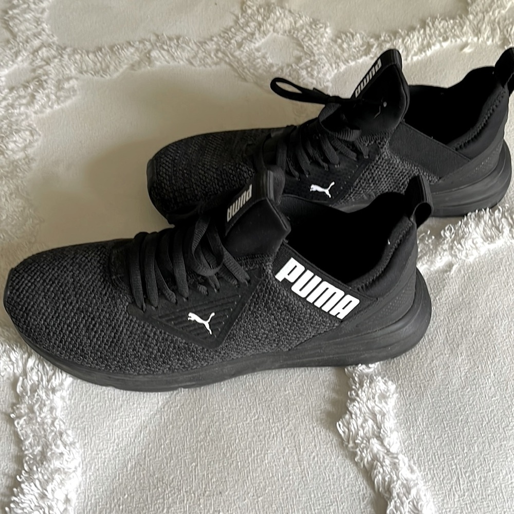 Mens Puma athletic shoes. Fits on the narrow side.